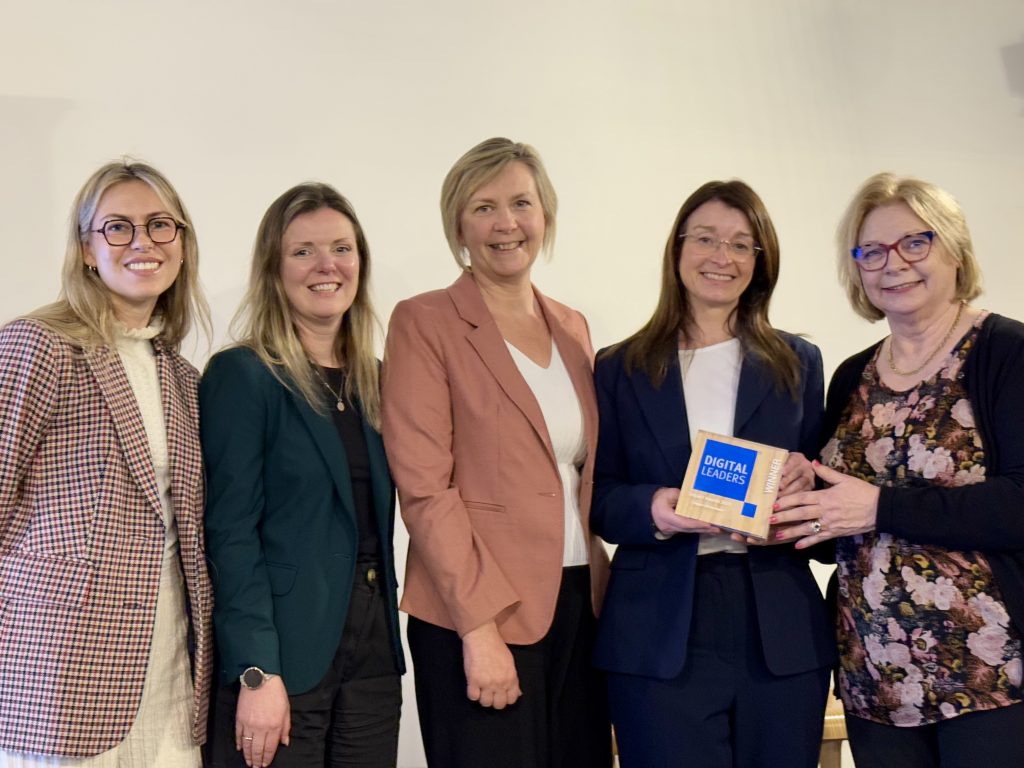 Liz St Louis and Nicol McConnell receiving People's Choice Award at Digital Leaders Impact Awards March 2025